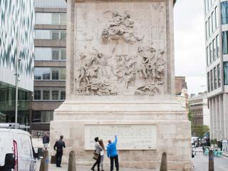 Looking up at The Monument's Frieze