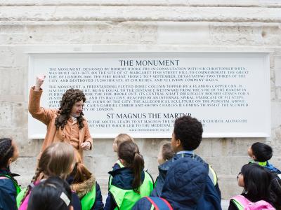 School Children meet an actor dressed as Dr Robert Hooke - The Monument to the Great Fire of London
